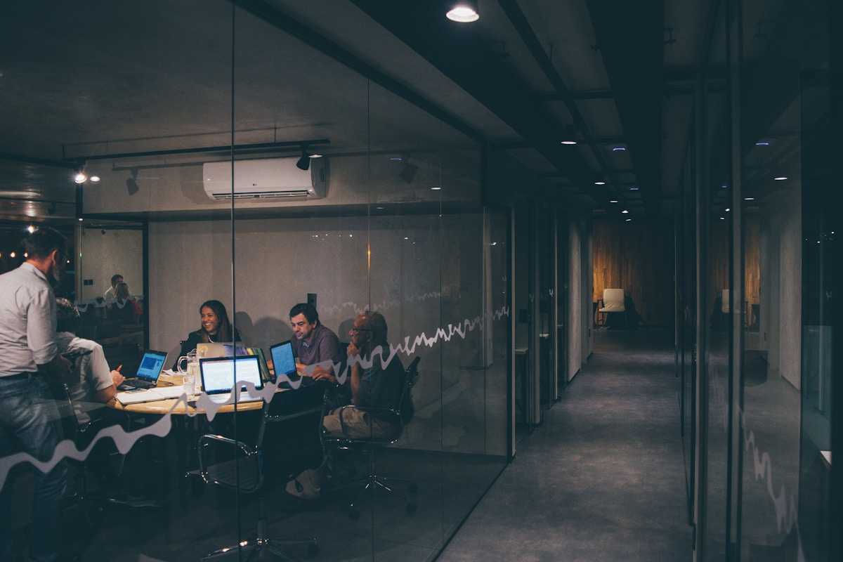 The DevLink360 team in a meeting